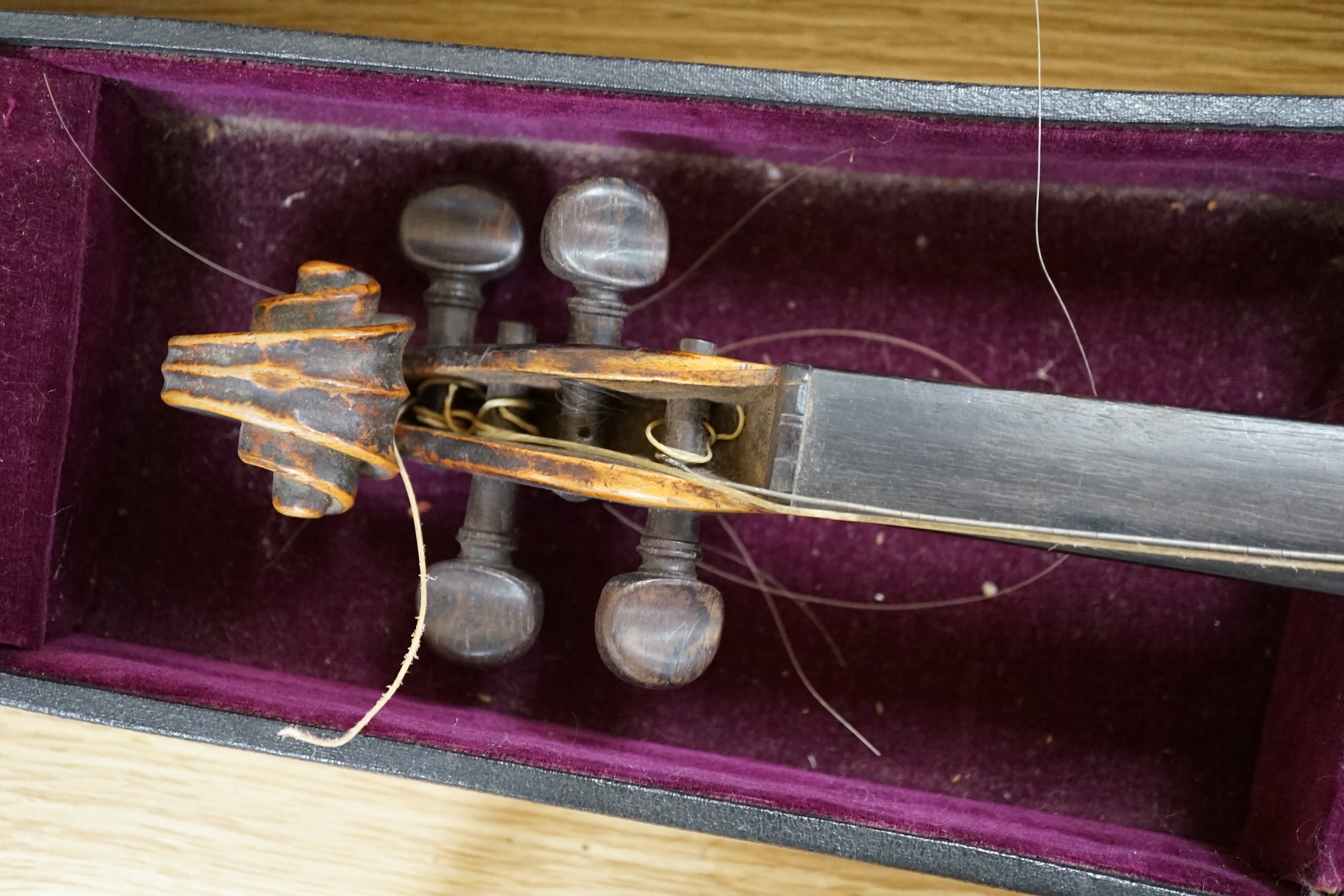 A George Craske (1797-1888) violin with a Hill & Son label, cased (a.f.)